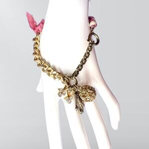 Vintage Bronze Charm Bracelet With Ribbon